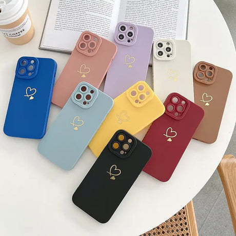 a group of four phone cases sitting on a table