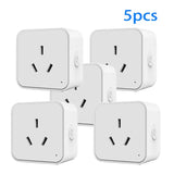 A group of four white plugs with a white background