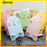 a group of paper animals sitting on top of each other animals