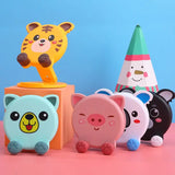 a group of small toys sitting on top of a table