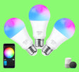 A group of three light bulbs with a remote control