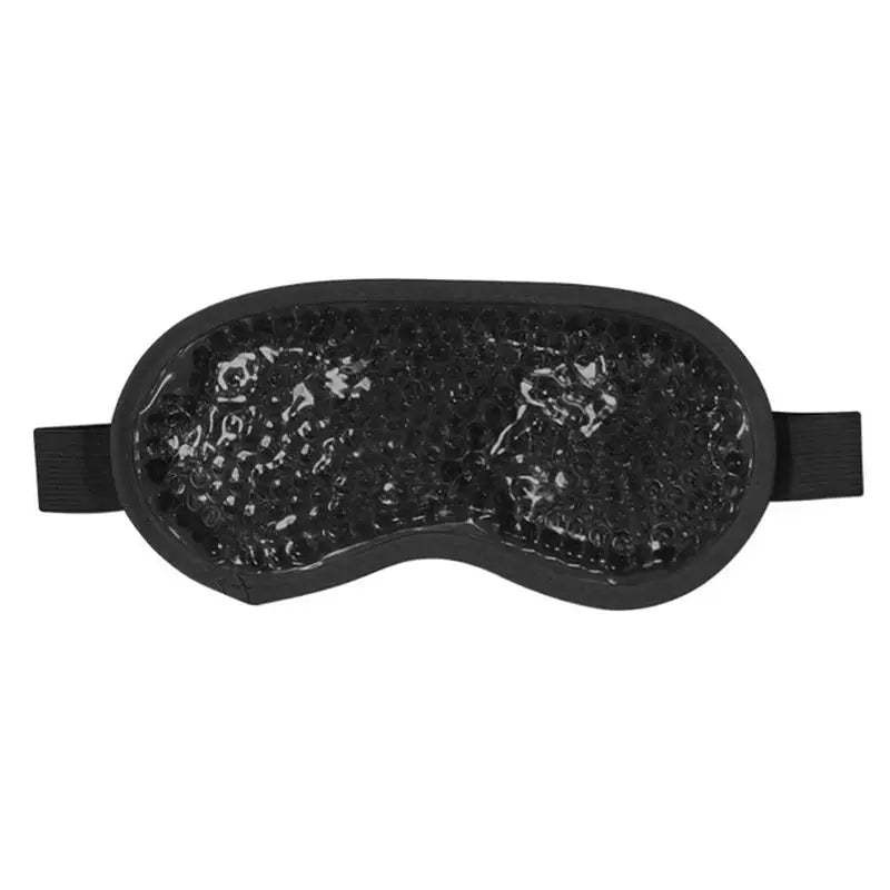 a black eye mask with black sei crystals