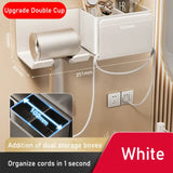 a white wall mounted charger with a usb cable