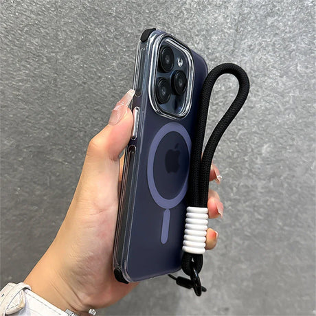 Hand holding a clear iPhone case with a black lanyard.