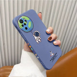 a hand holding a phone case with a cartoon character on it