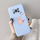 a hand holding a phone case with a cartoon pig on it