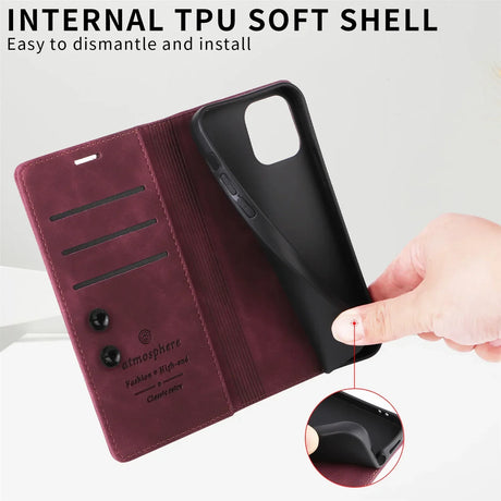 A hand holding a phone case with a phone in it