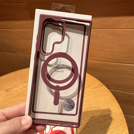a hand holding a phone case with a phone in it