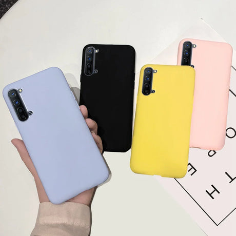 a hand holding a phone case with three colors