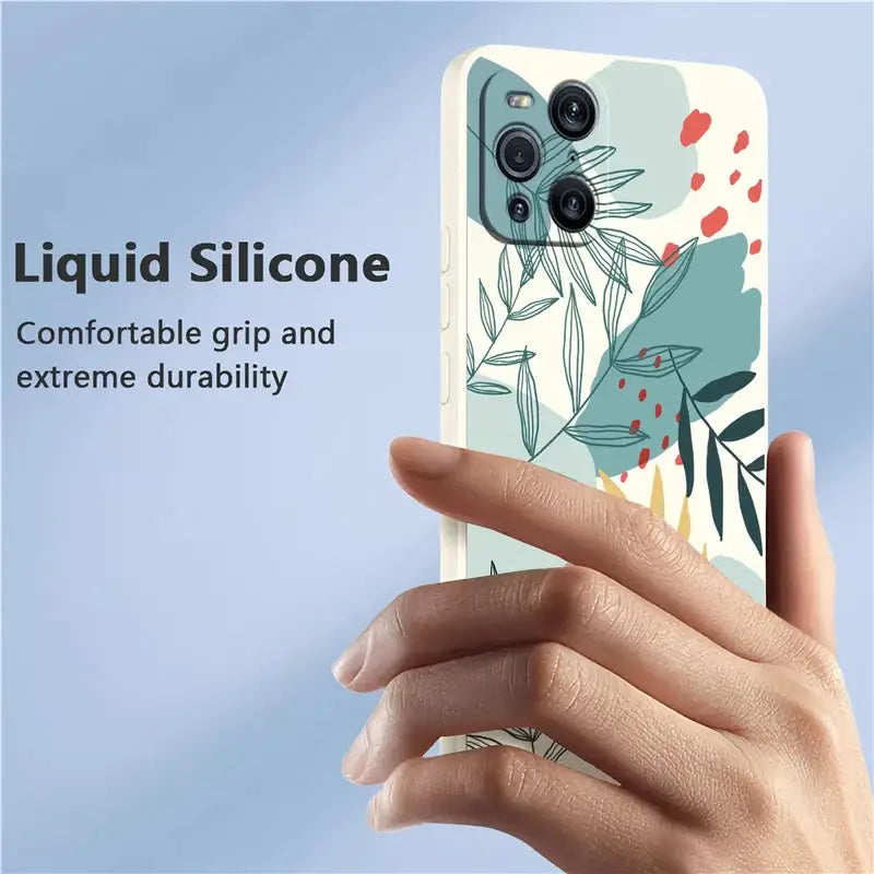 a hand holding a phone with a floral design on it