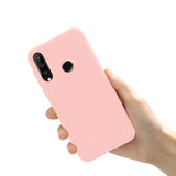 a hand holding a pink iphone case