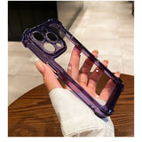 a hand holding a purple case with a camera lens