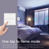 a hand is holding a smart light switch