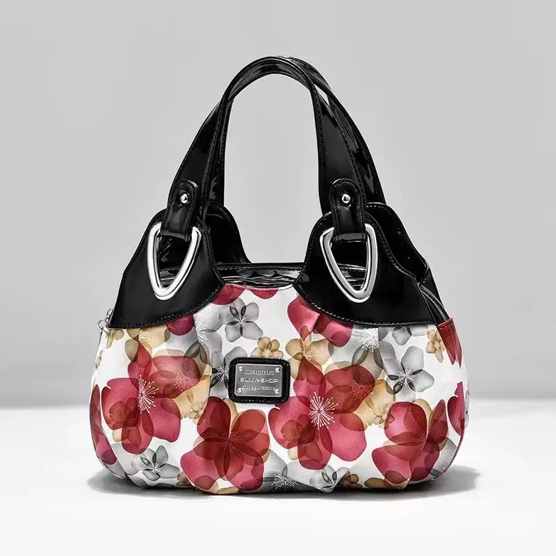 a handbag with a floral pattern on it