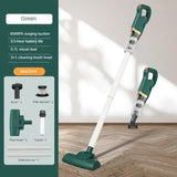 a green vacuum cleaner on a wooden floor