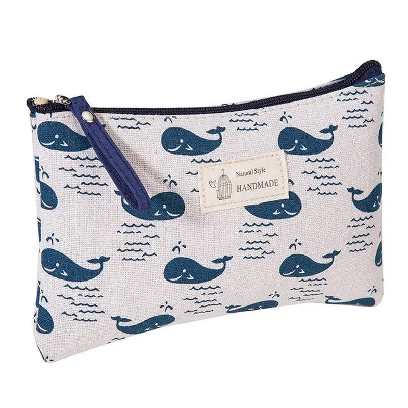 a small pouch bag with a whale print