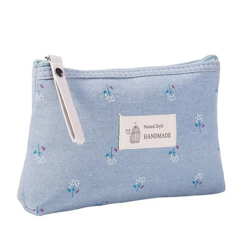 a blue bag with a bird print on it