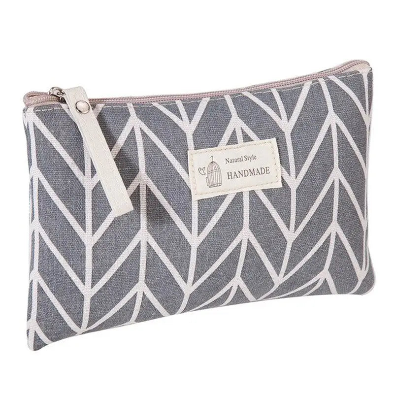 the small cosmetic bag in grey and white