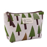 a small pouch bag with trees on it