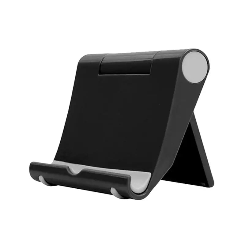 a black tablet stand with a white circle on top