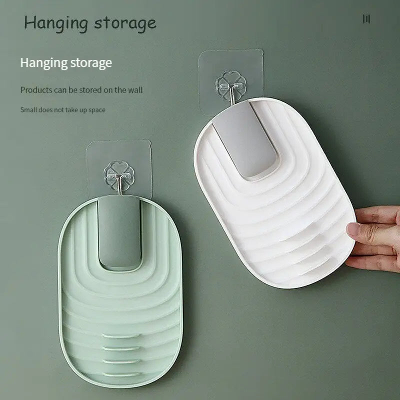 a hand holding a hanging storage rack