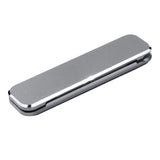 a silver money clip on a white background