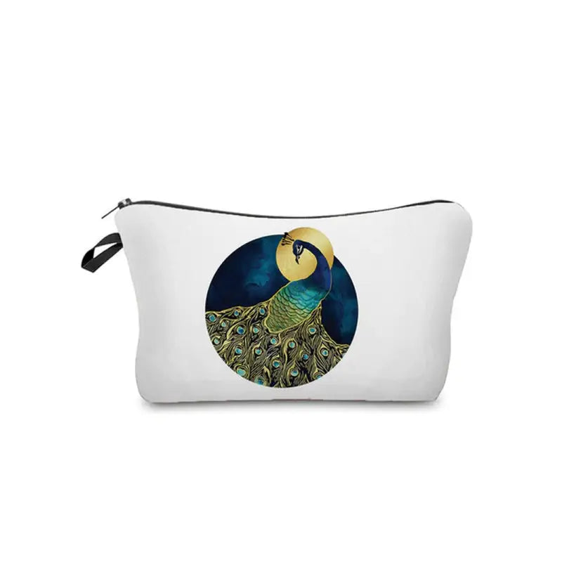 a white cosmetic bag with a peacock design on it