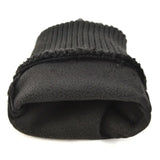 a black wool hat with a black knit