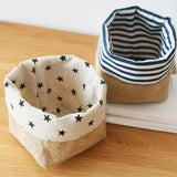 a small dog bowl with a black and white star print