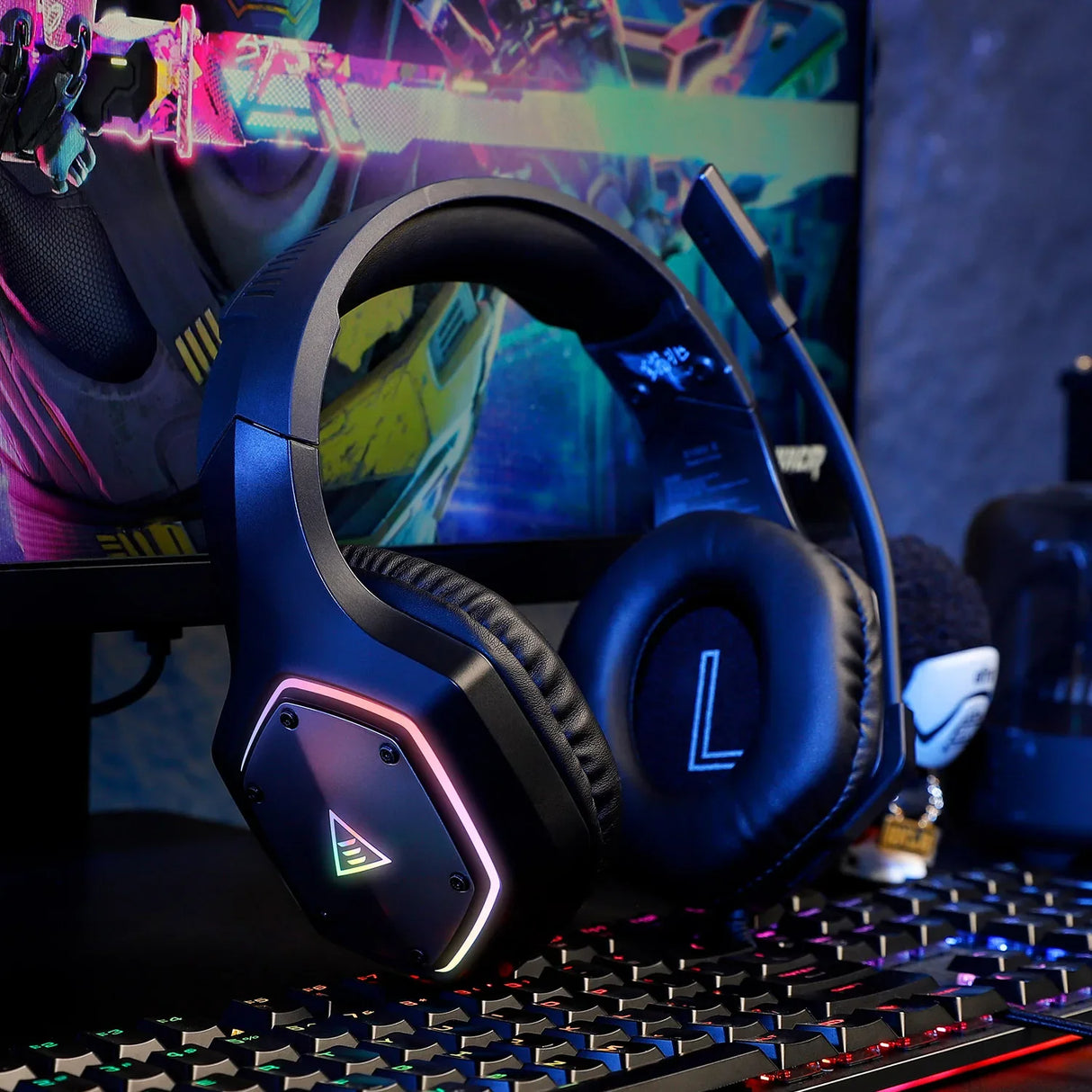 Gaming headset with illuminated accents and an ’L’ logo on the ear cup.