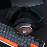 Gaming headset with illuminated hexagonal logo on the ear cup.