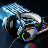 Gaming headset with RGB lighting resting on a colorful illuminated keyboard.