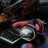 Gaming headset with RGB lighting and red ear cushions.