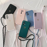 a set of four phone cases with a heart on the back