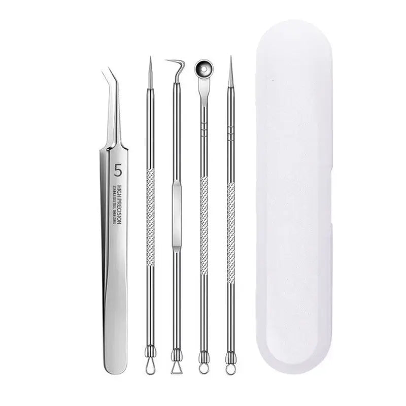 a set of dental instruments with a white case and a pair of scissors