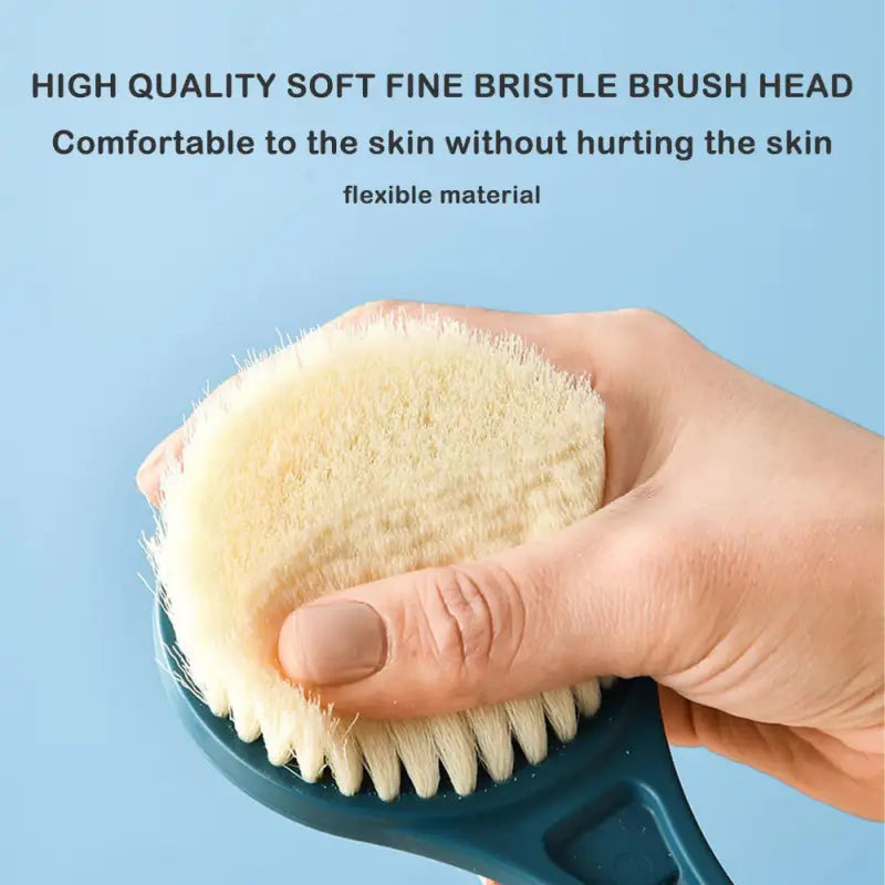 a person holding a brush with a white bre