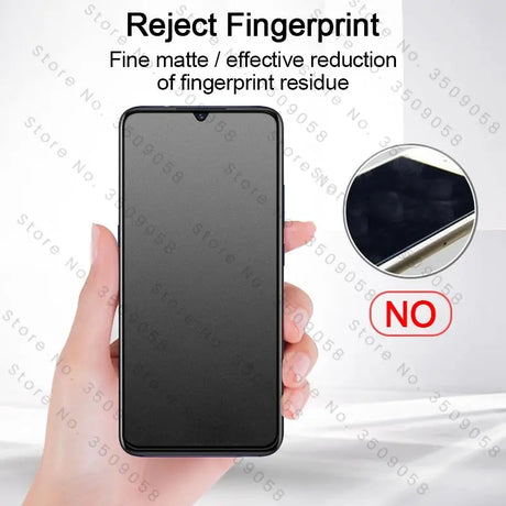 a hand holding a black phone with a black screen