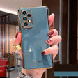 a woman holding a blue phone case