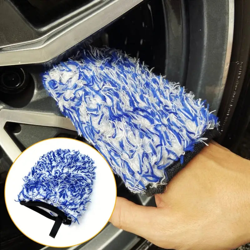 a hand holding a blue and white brush brush