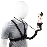 a man wearing a camera strap with a cell