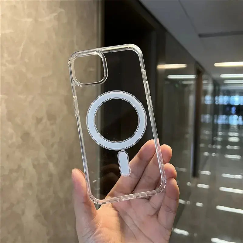 a hand holding a clear phone case with a circular design