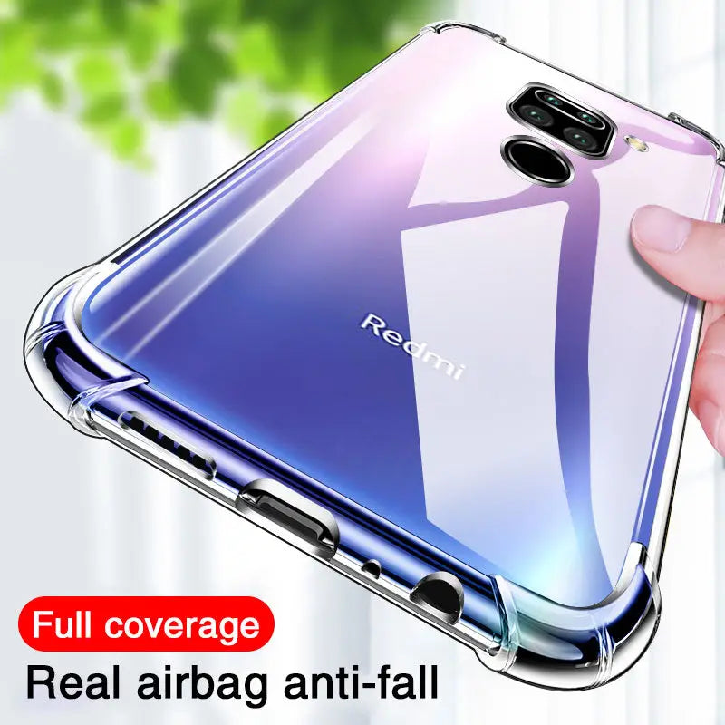 a hand holding a clear case with the back of a samsung s9