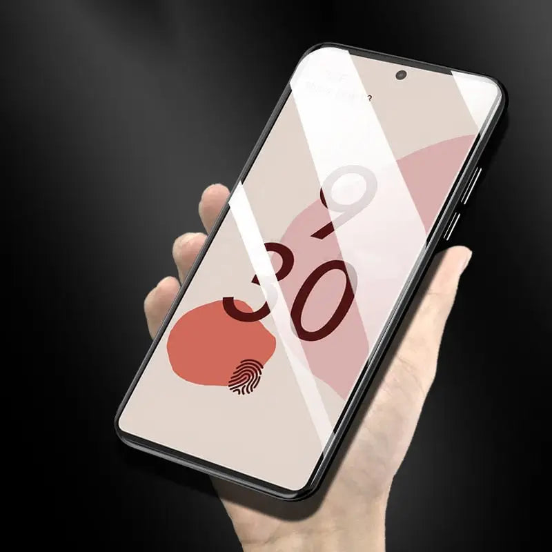 a hand holding an iphone with a pink flaming on it
