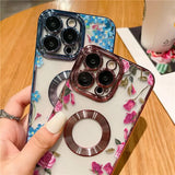 a hand holding a phone case with a flower design