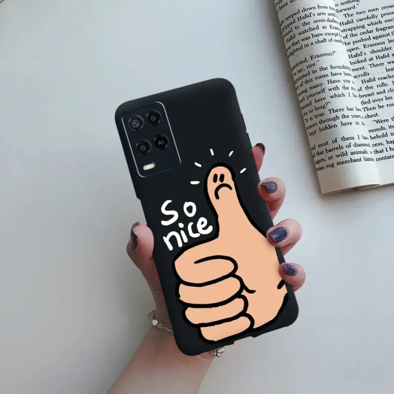 a hand holding a phone case with the word’s me on it