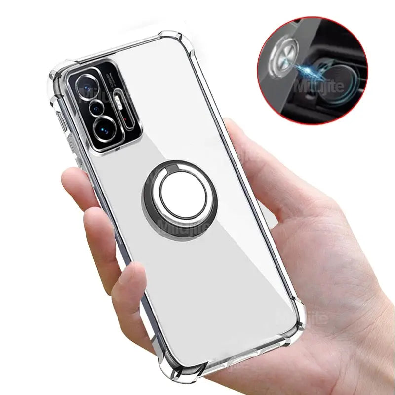 someone holding a phone with a ring case on it