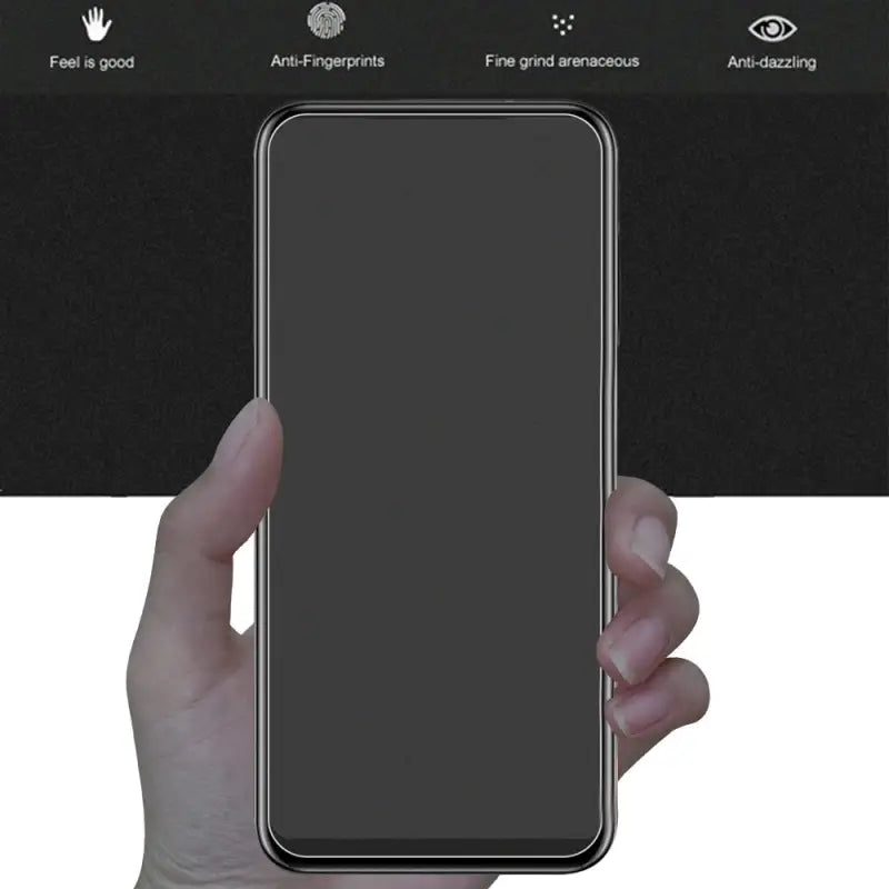a hand holding a phone with a black screen