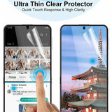 a hand holding a phone with a screen protector