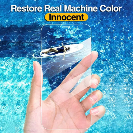 a hand holding a phone with a picture of a man in the water