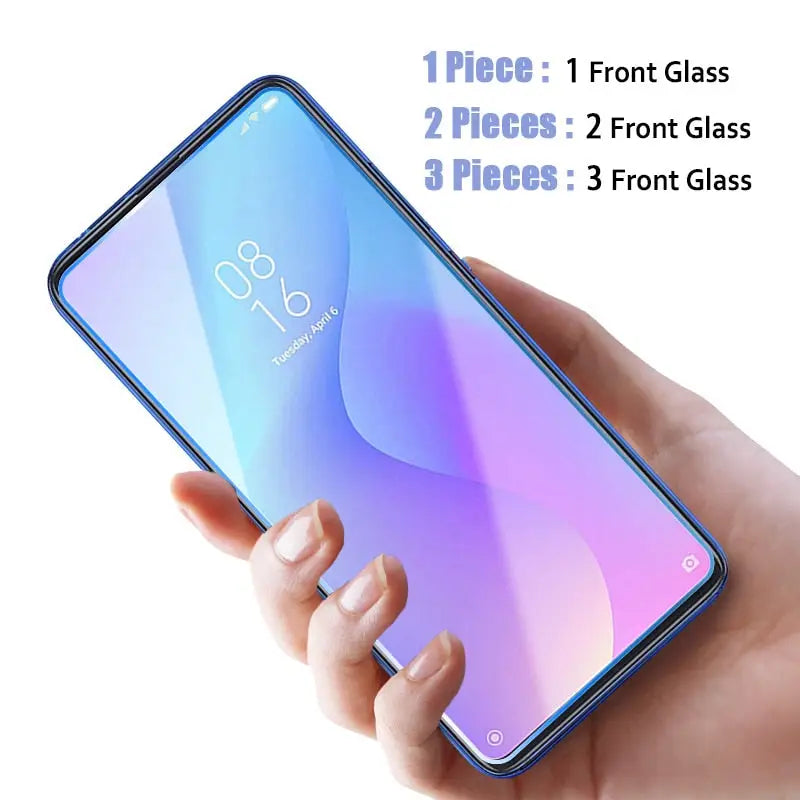 a hand holding a samsung note 9 with the screen protector glass